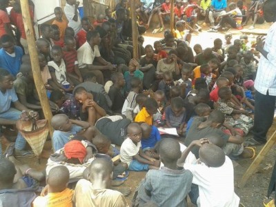 Feeding poor homeless  children in uganda.